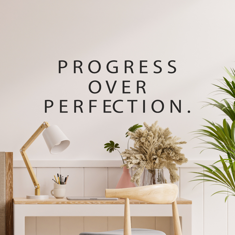 Motivational wall decal featuring inspirational wall quotes and stickers for progress-over-perfection. 