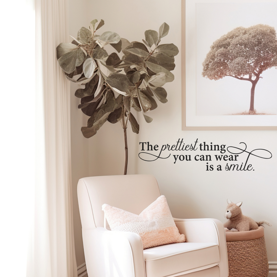 Motivational wall decal featuring inspirational wall quotes and stickers for the-prettiest-thing-you-can-wear-is-a-smile. 