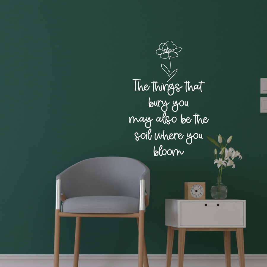 Motivational wall decal featuring inspirational wall quotes and stickers for the-things-that-bury-you-may-also-be-the-soil-where-you-bloom. 