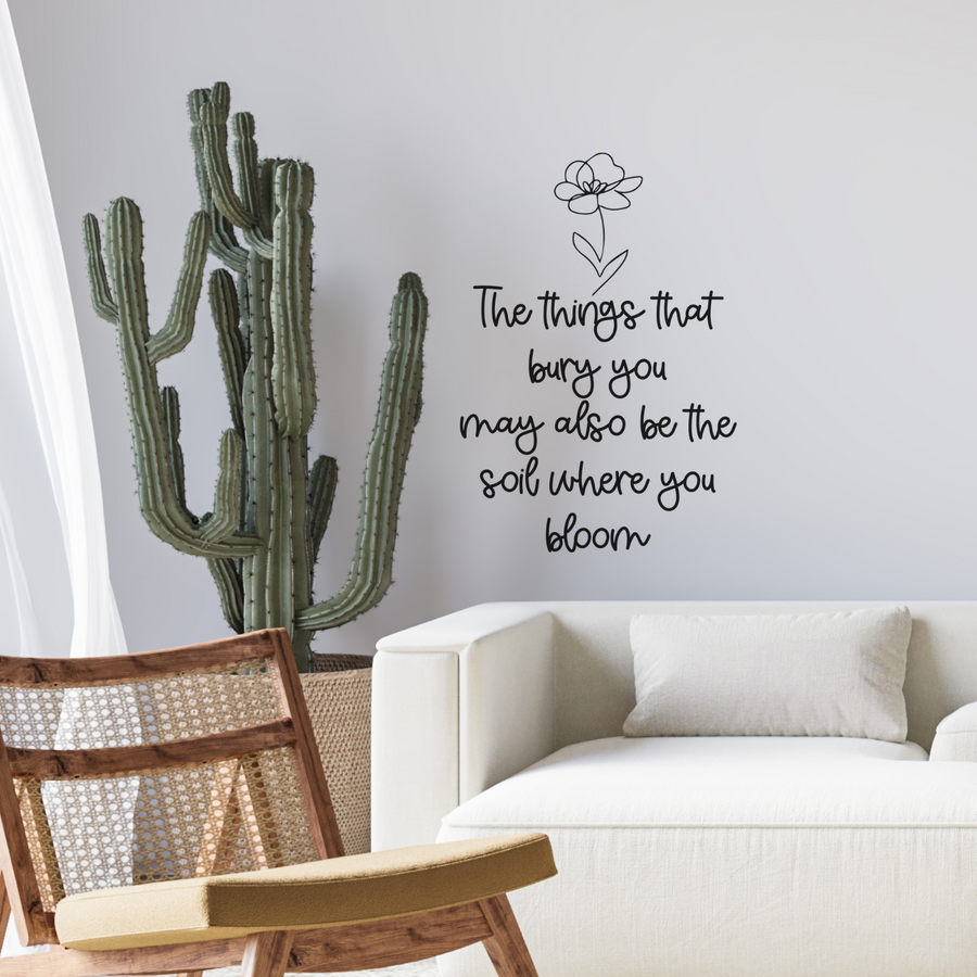 Motivational wall decal featuring inspirational wall quotes and stickers for the-things-that-bury-you-may-also-be-the-soil-where-you-bloom. 